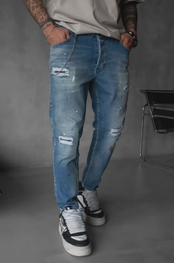 Blugi slim fit cu lant, rupturi si efect stropit (cod 6758)